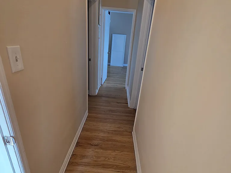 Hallway
Bathroom on the right
Master bedroom on left
Second bedroom at end of hall