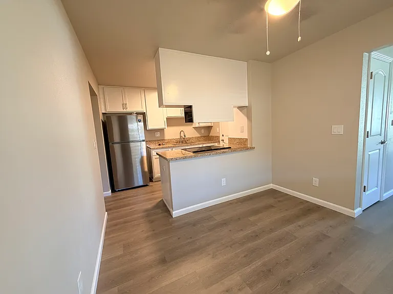 Dining area into kitchen.