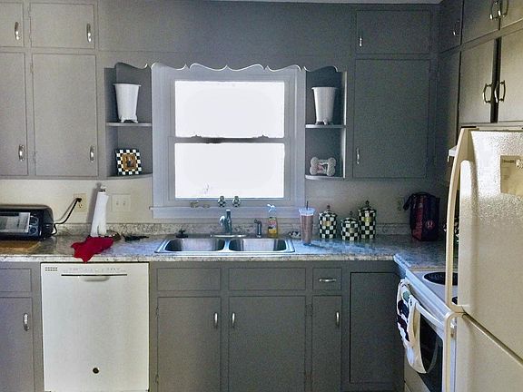 Kitchen: New deep, stainless steel sink, new counter-tops, cabinet doors painted with a beautiful, muted grey, chalk paint and new brushed nickel pulls added. Picture from prior tenant.