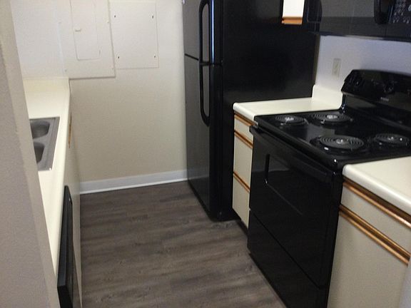 New flooring is vinyl wood plank; new appliances