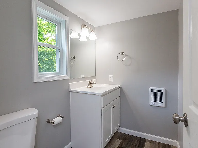 Powder room at back of house