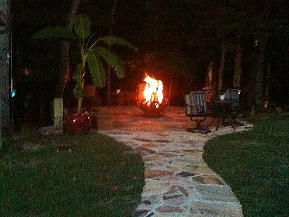 Walkway to patio with firepit