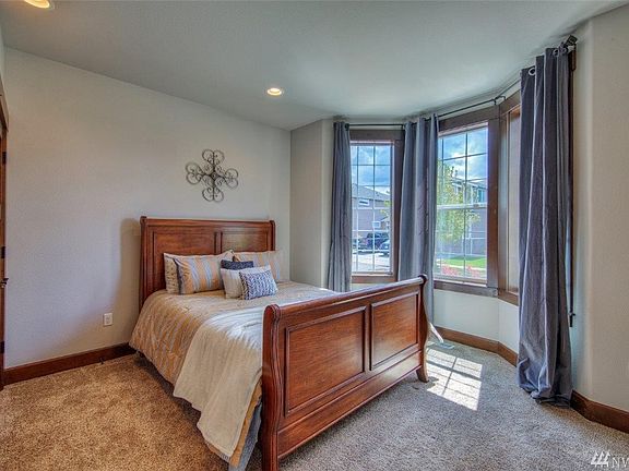 Main floor bedroom or office with bay window.