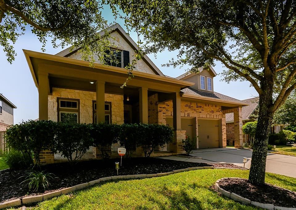 Welcome to 10930 Milano Court, with 3-Car Tandem Garage extended covered porch and mature landscaping this home has an abundance of curb appeal.