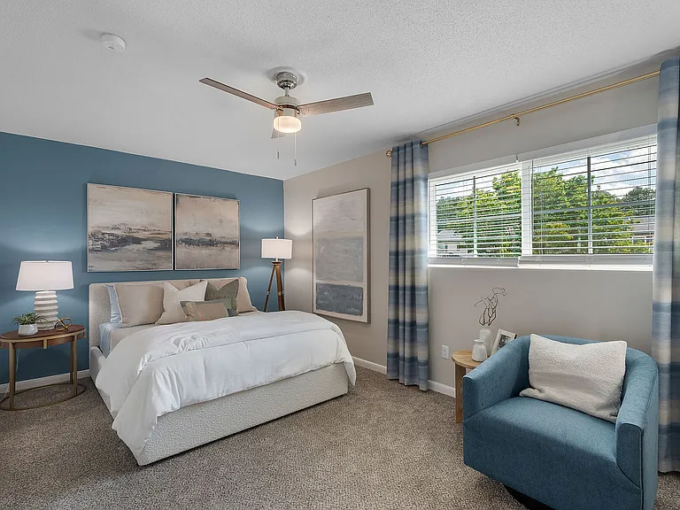 Bedroom with carpet & ceiling fan