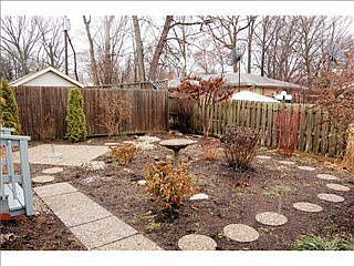 Beautiful backyard meticulously landscaped and maintained by a Master Gardner.