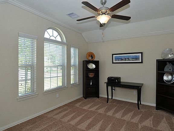 Triple windows bring in the light for a great work at home space.