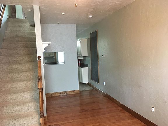 Open floorplan dining room with pass thru to kitchen