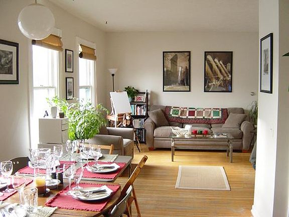Living room with hardwood floor, high ceiling, 3 large windows with south- eastern for abundant light.