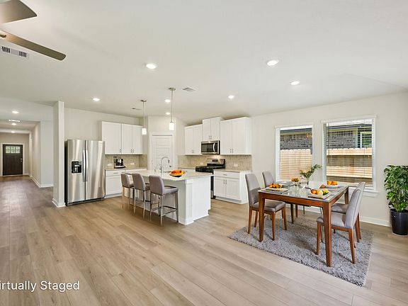 The Henderson floorplan in Stewart s Ranch of Conroe, TX.