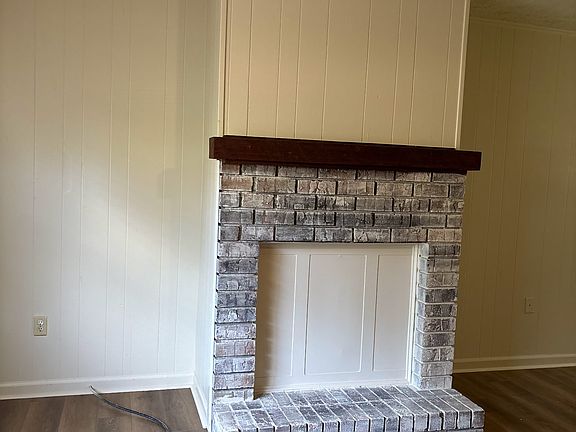 Living room faux fireplace.
