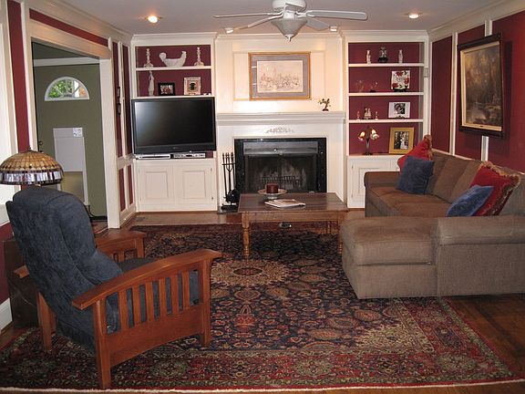 Spacious Family Room with built-in bookshelves and gas fireplace.  