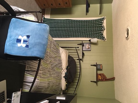 Bedroom #1 shown with twin size bed. The great part of this is the walk in closet.