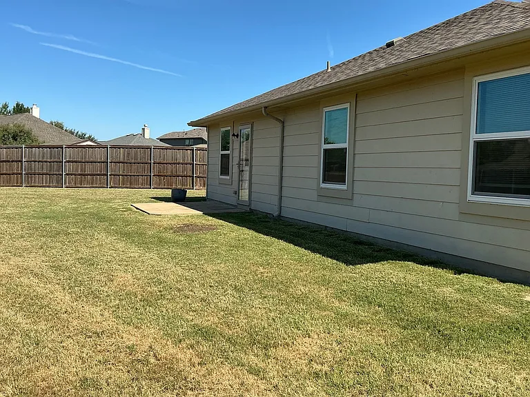 Open patio is right outside the kitchen door
