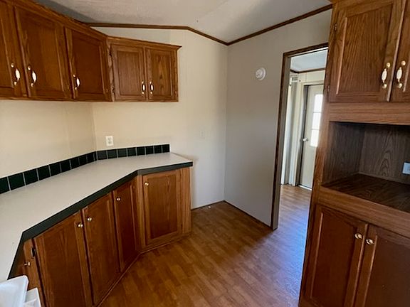 Kitchen with space for refrigerator. **Tenant will supply**