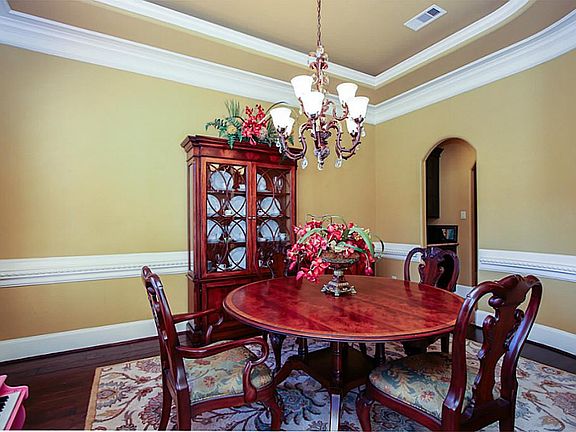 Formal Dining with tons of crown molding.