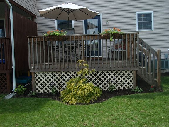 Back with landscaped deck