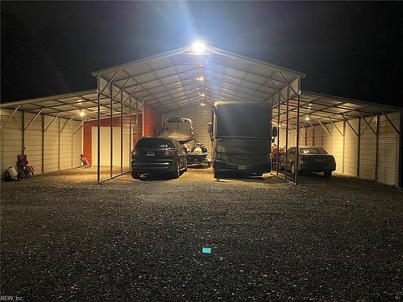 Humongous Carport with one car garage!