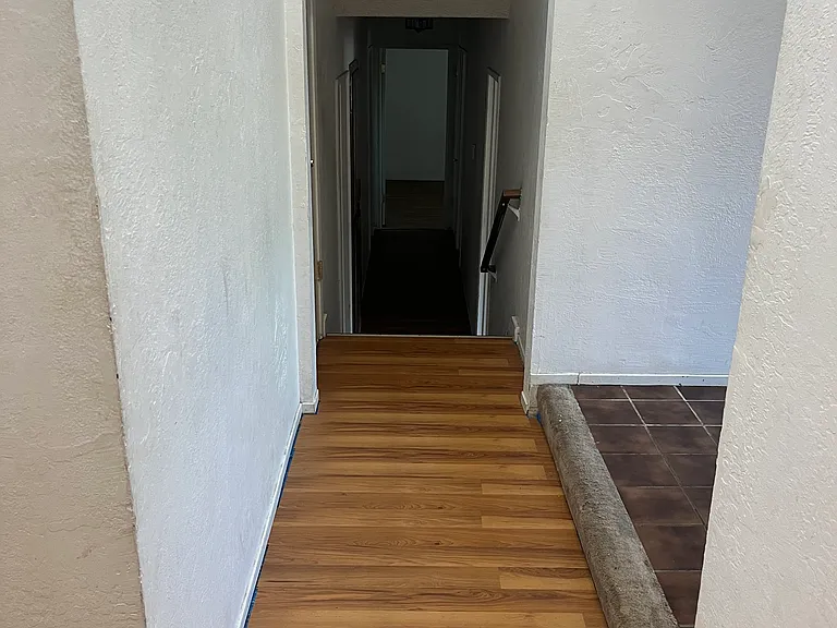 Hallway that leads to the bedrooms