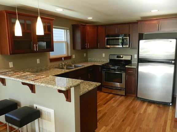 Spacious Kitchen with Breakfast Bar