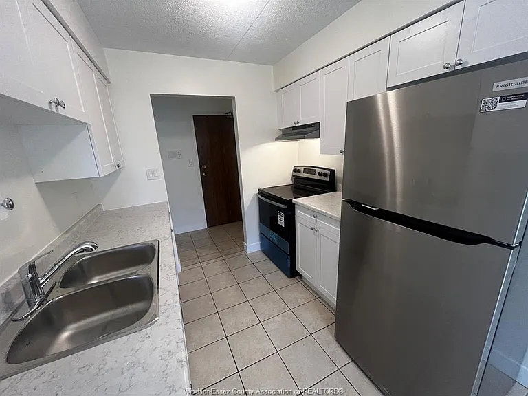 11822 Tecumseh Rd E #105 — Photo 2