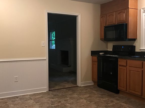 New quality flooring, light fixtures and fresh paint in Kitc