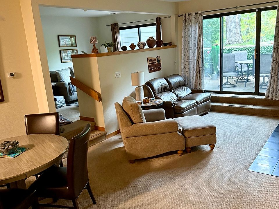 Open floor plan showing the living room and office/guest room.