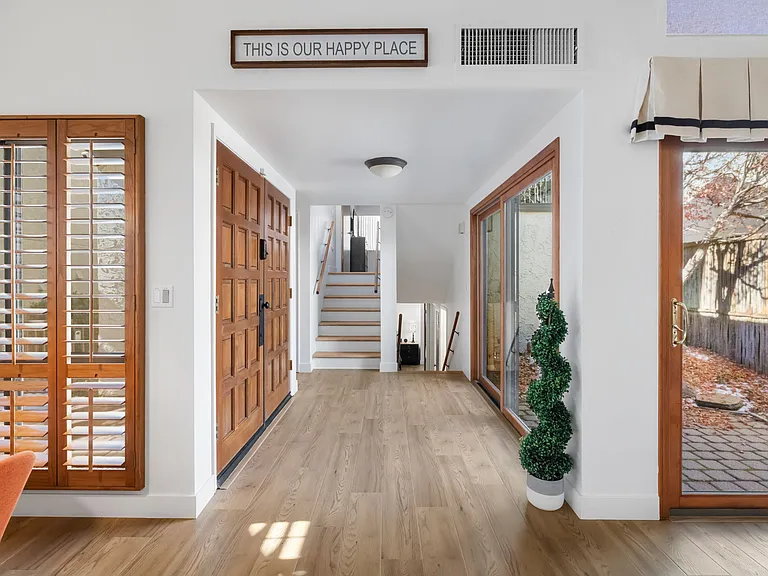 The spacious main entry opens to a flowing floor plan.