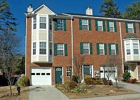 four side brick end unit with 1 car garage