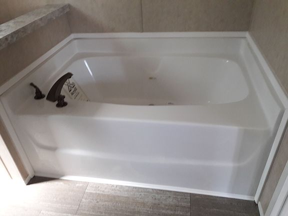 Wind down in a huge garden bathtub