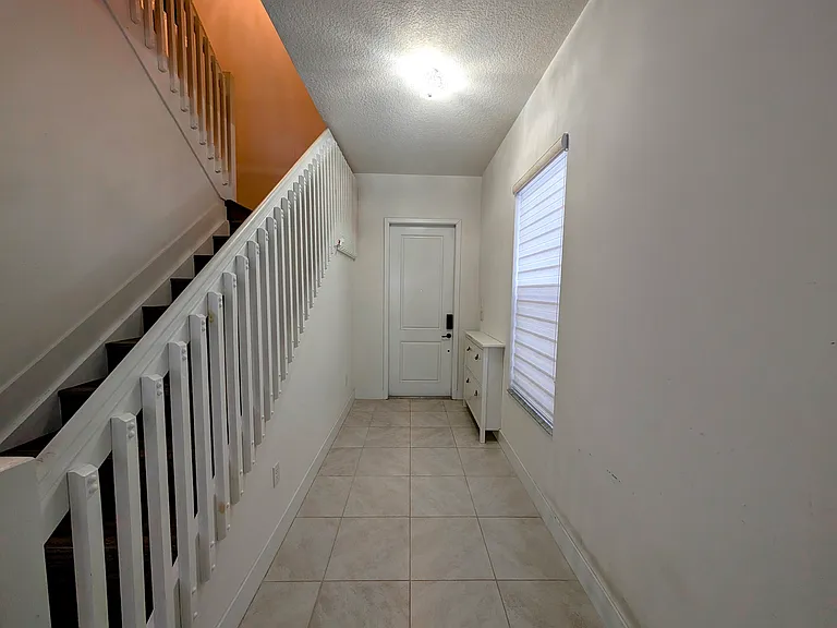 Foyer features shoe storage(can be removed upon request)