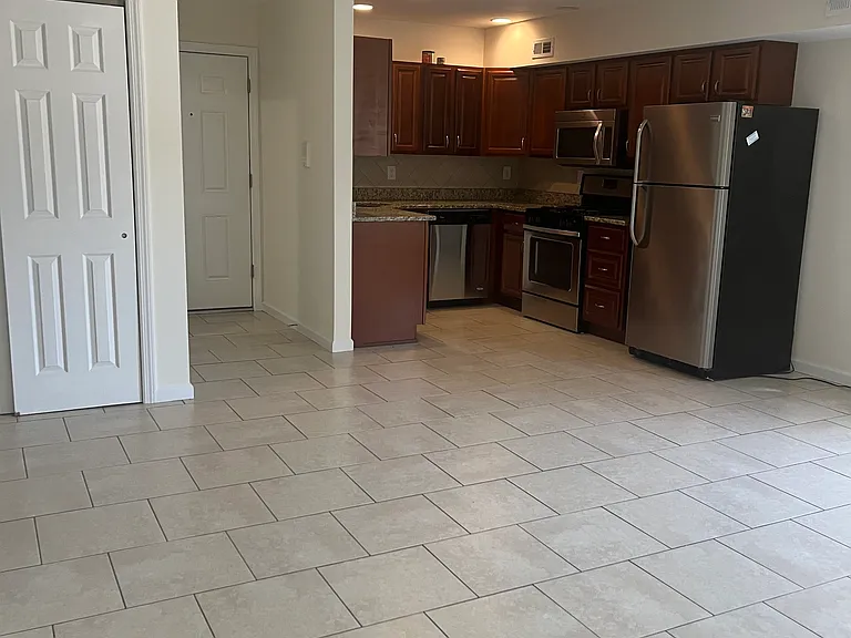 Entry, Livingroom and kitchen area and closet