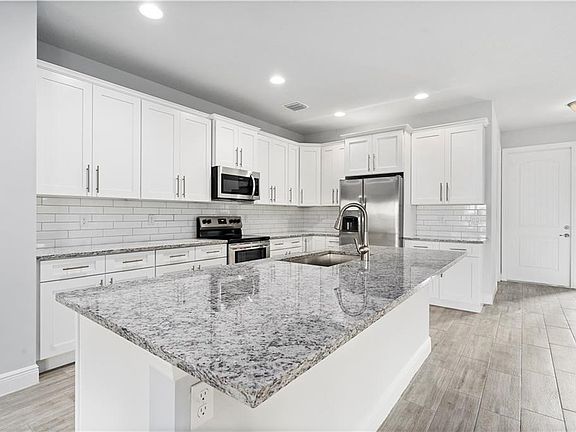 Kitchen with custom soft close cabinets