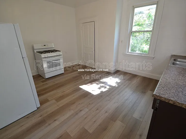 1658 Iliff Ave — Photo 5