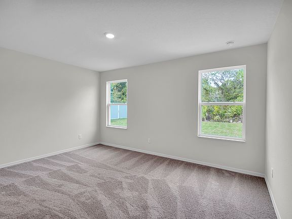 Enjoy unwinding after a long day in the master suite