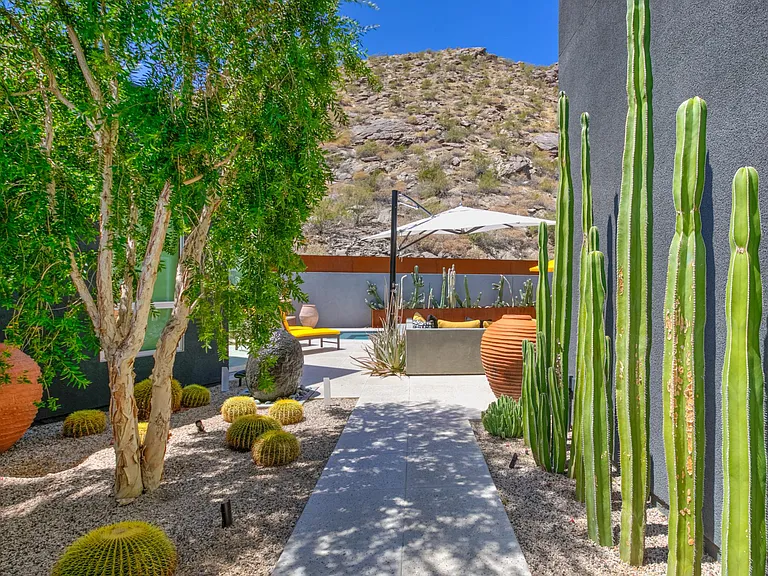 Walkway to pool, garden and outdoor entertaining area.