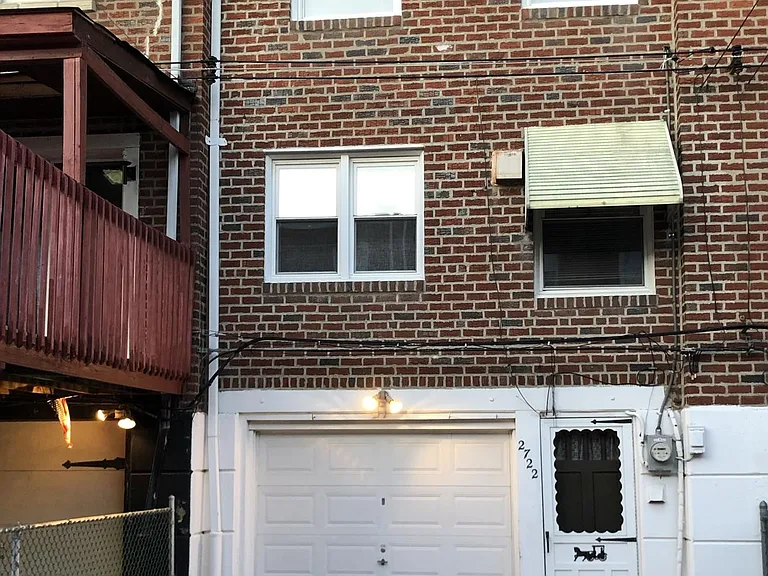 Garage with space for additional car outside
