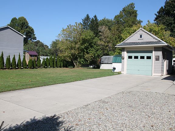Garage, side yard, driveway