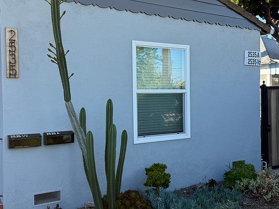 Entrance to the apartment from the front house