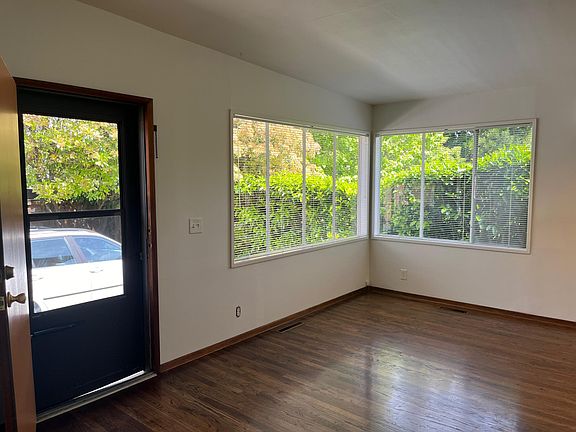very large living space with oversized windows, great light