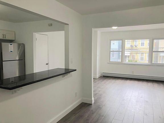Spacious dining area and living room with plenty of sunlight