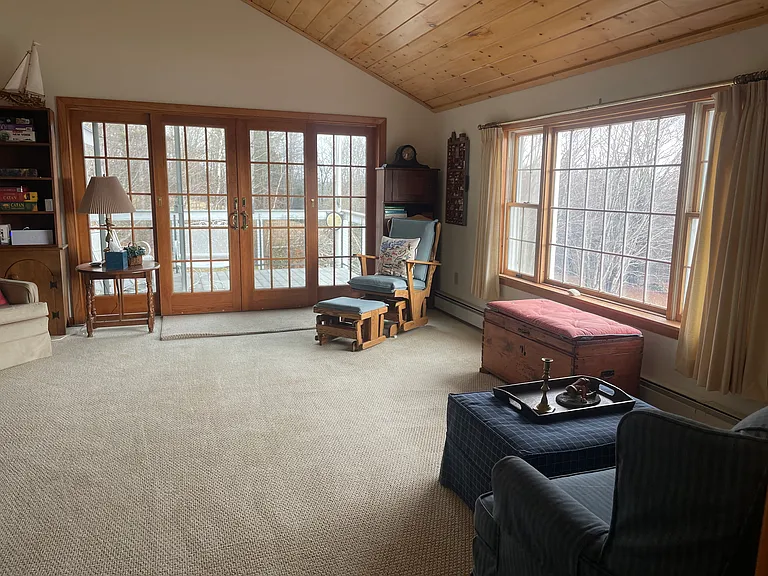 Living room with custom sliding doors to deck