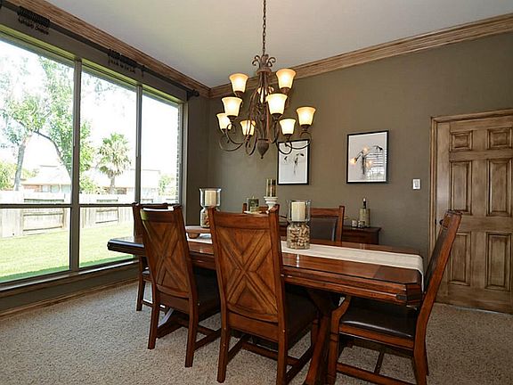 Beautiful Formal dining offers plenty of natural light.