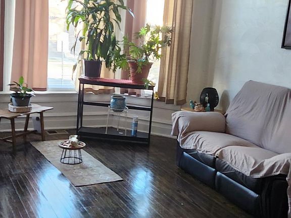 Living Room with original refinished hardwood wood floors