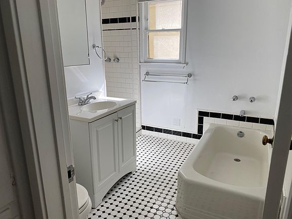 Bathroom with separate tub and shower
