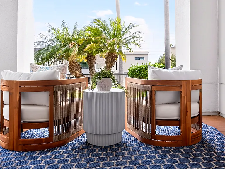 Covered patio with partial ocean view