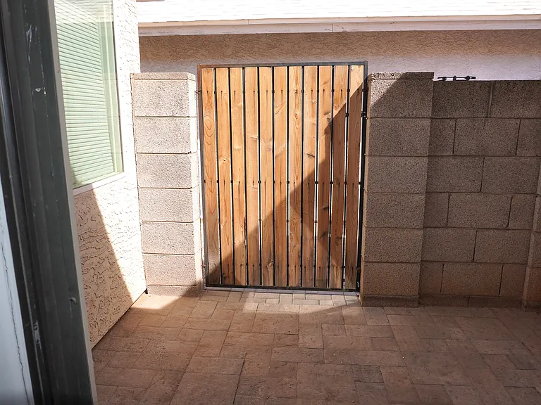 Fenced patio View from exiting 2nd bedroom.
