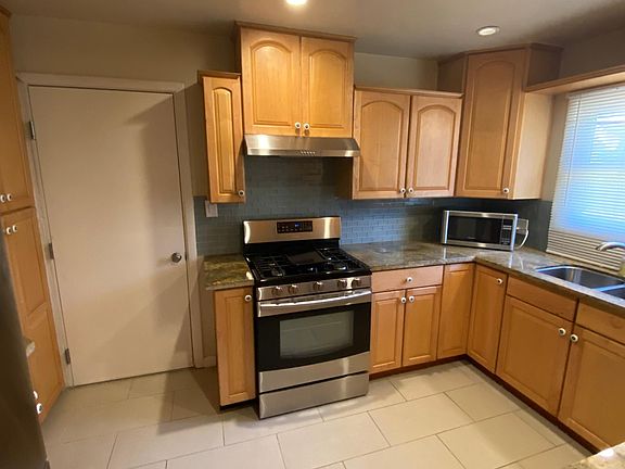 3rd image of 6184 8th Ave