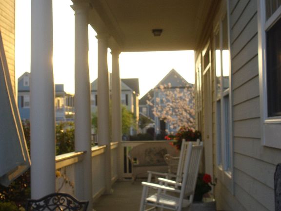 Downstairs side porch is accessed thru french doors off living & dining rms.  