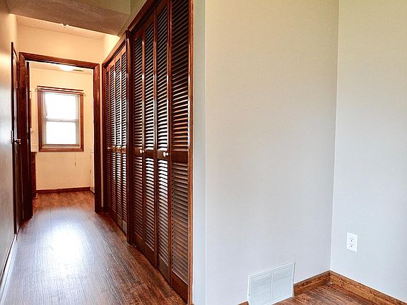 Lower Level Storage and Entry from 1 Car (27 ft long!) Attached Garage